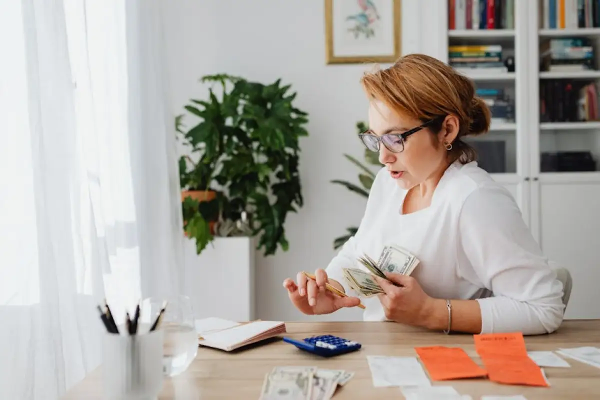 elderly worker counting money