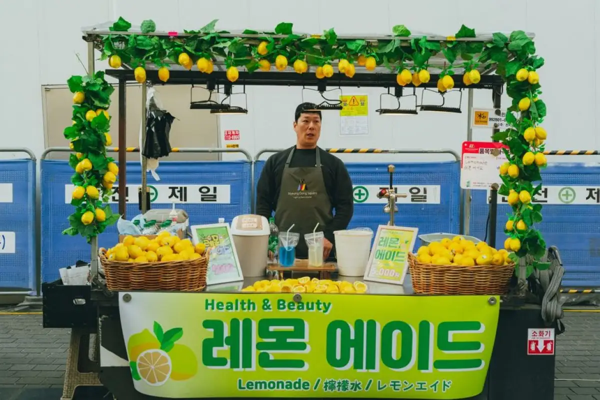 boy selling lemonade