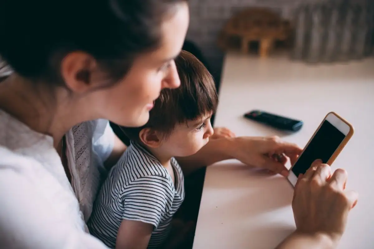 parent using smartphone