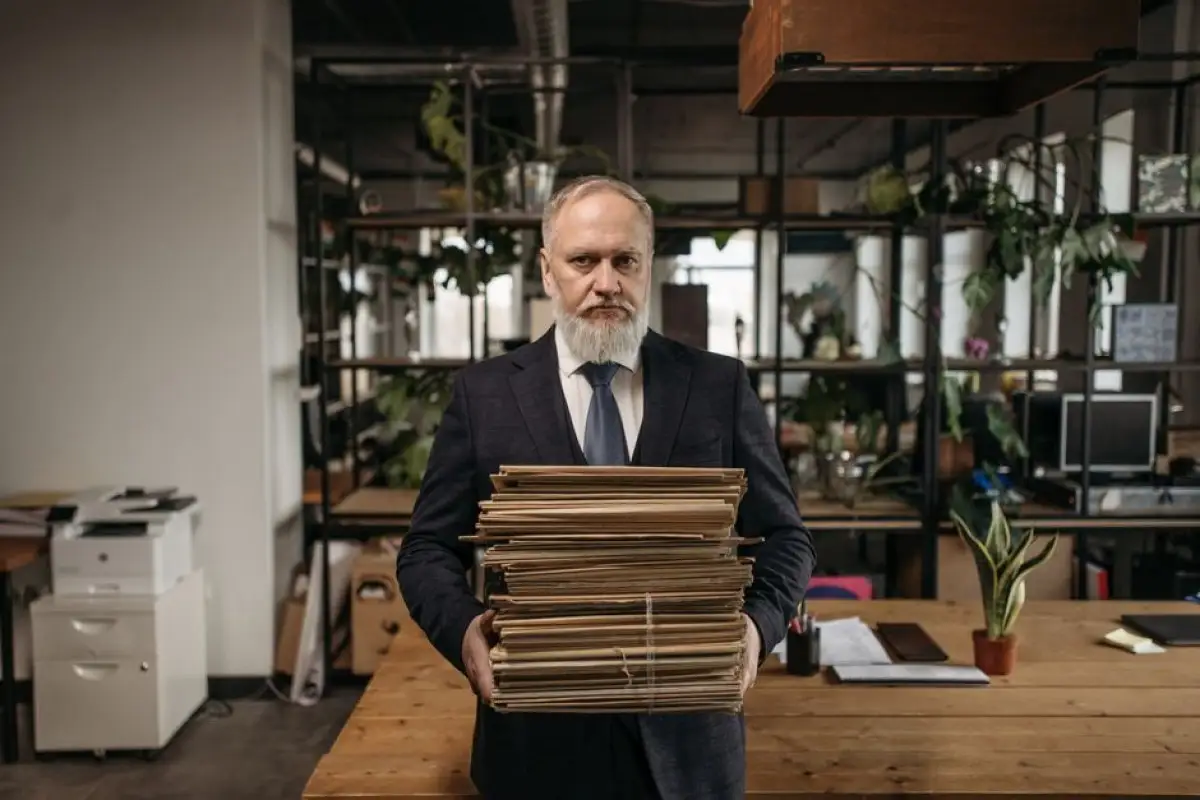 senior with documents