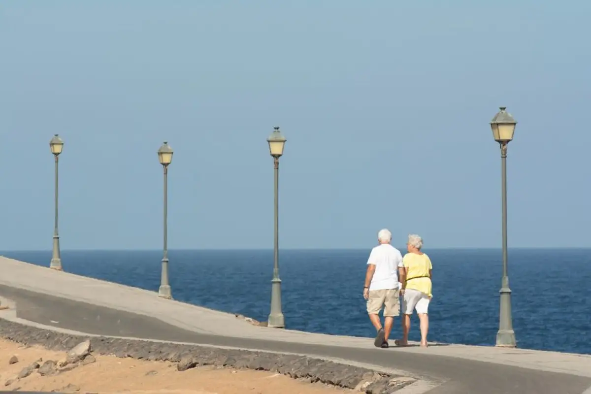 elderly couple walking