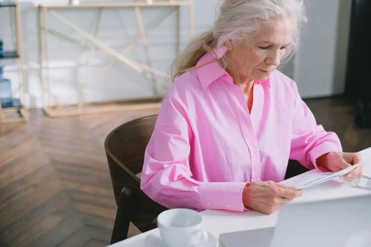 senior woman calculating pension
